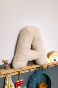 boucle letter cushion A teddy pillow by bettys home next to maileg mouses